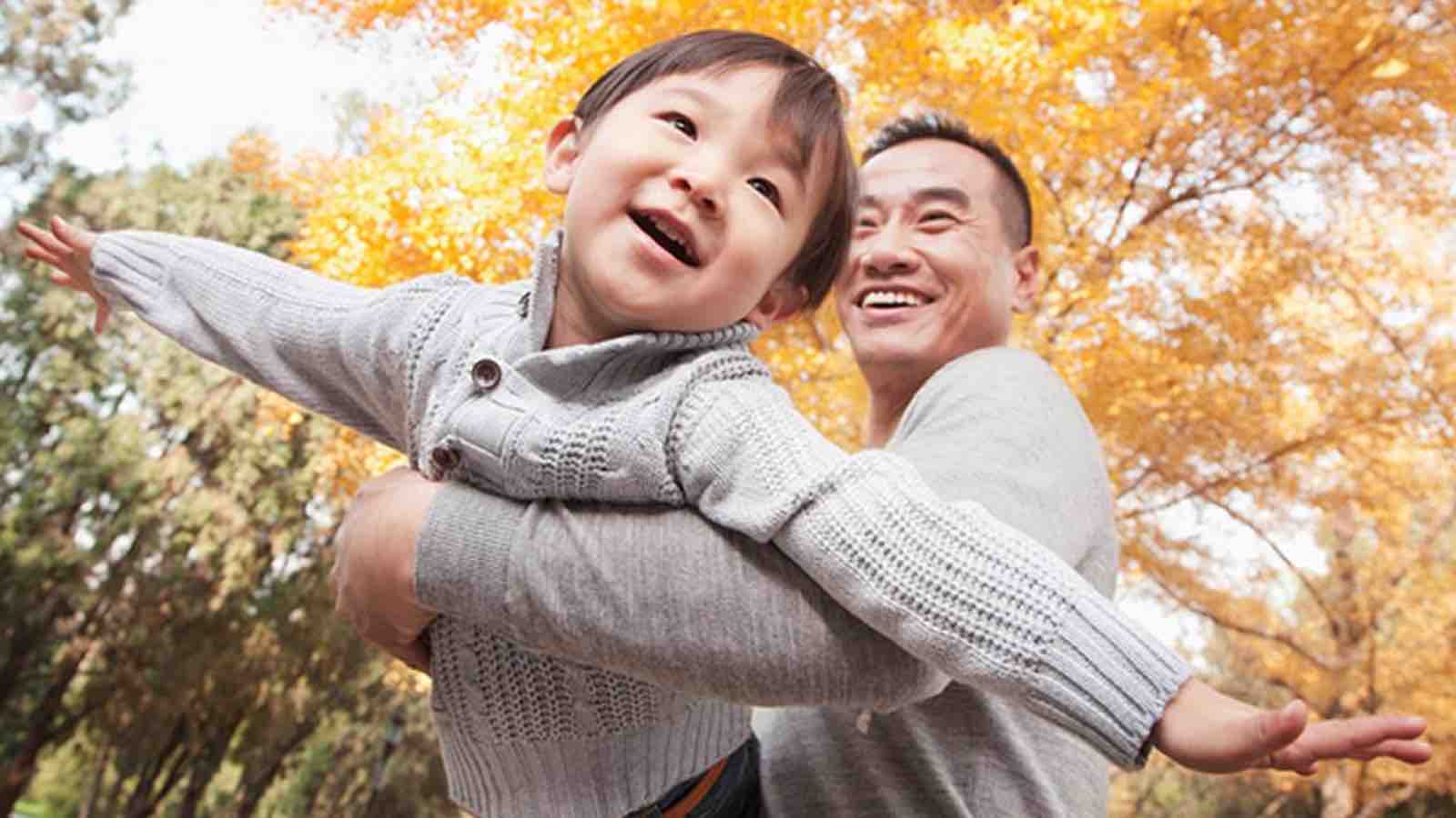 holding-back Father and son