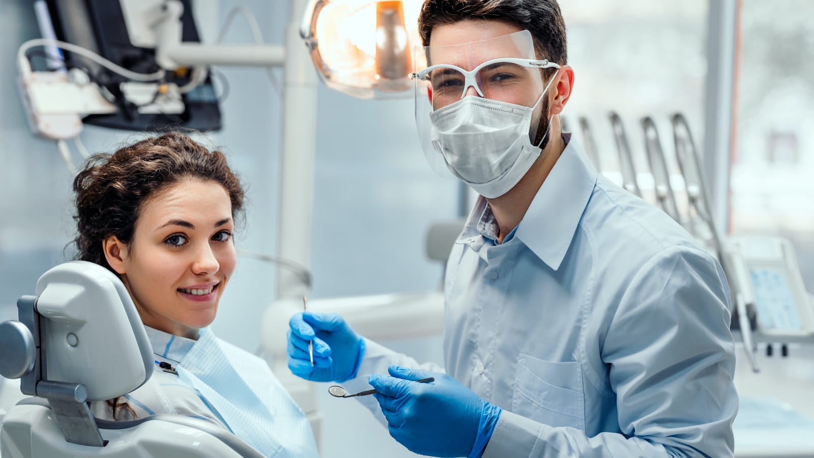 Dentist-Patient-Teeth-Cleaning.jpg