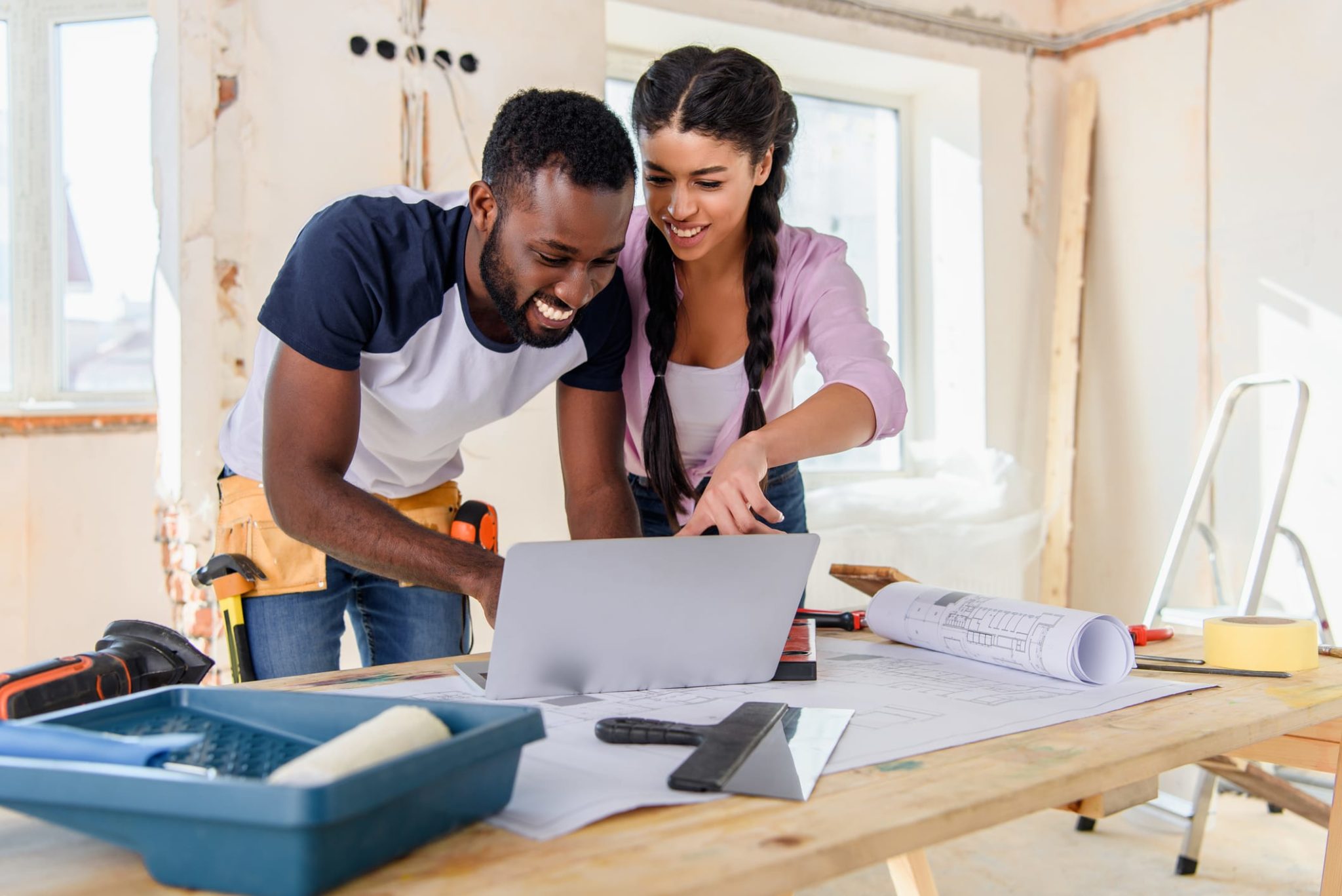 GettyImages-1072495896 (1) Happy African American Couple Renovating Home