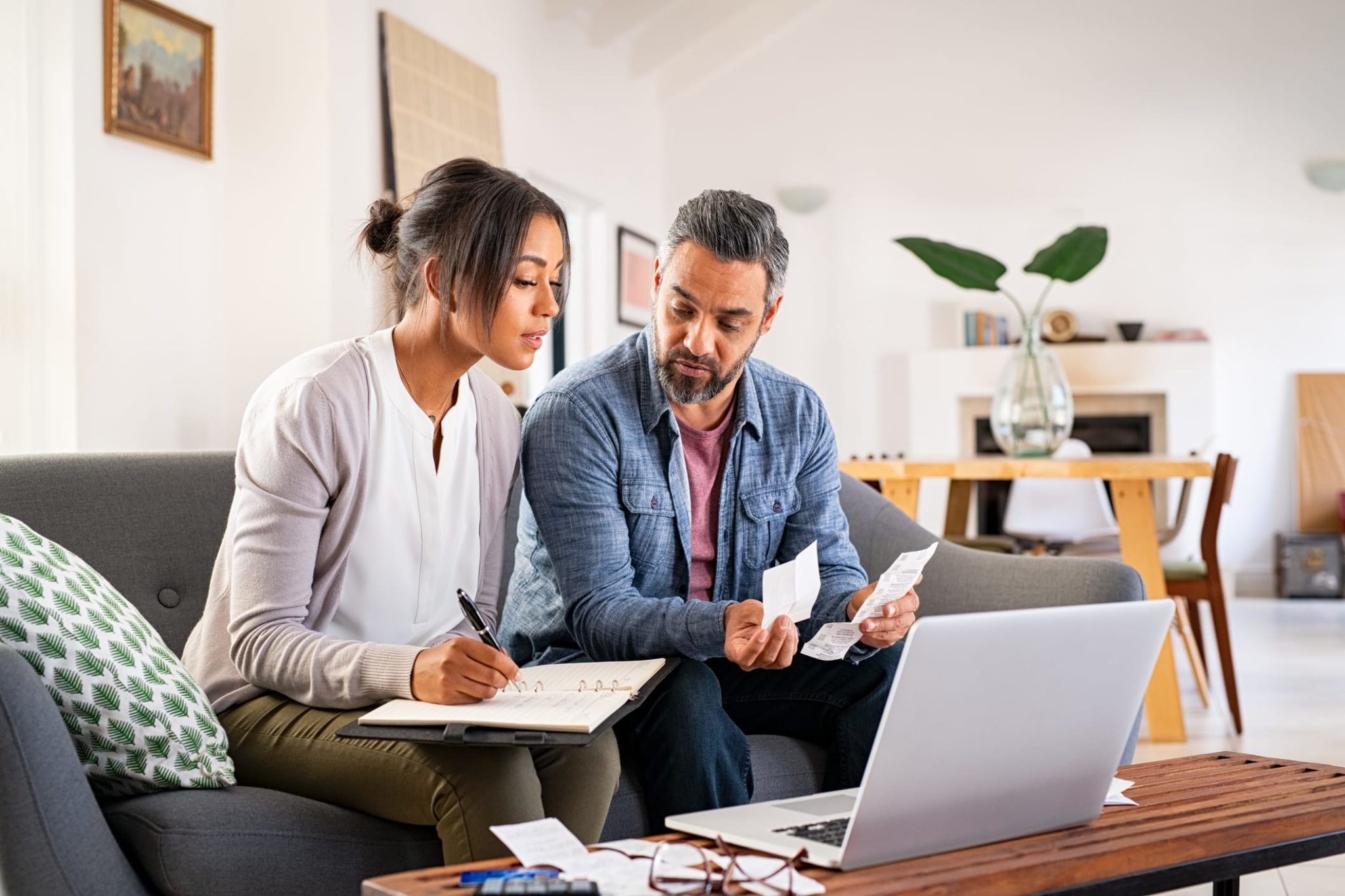 GettyImages-1319766088 Latino Couple Reviewing Paperwork