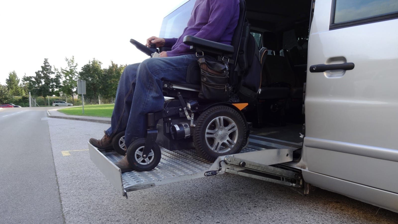 Man in an electric wheelchair Man in an electric wheelchair