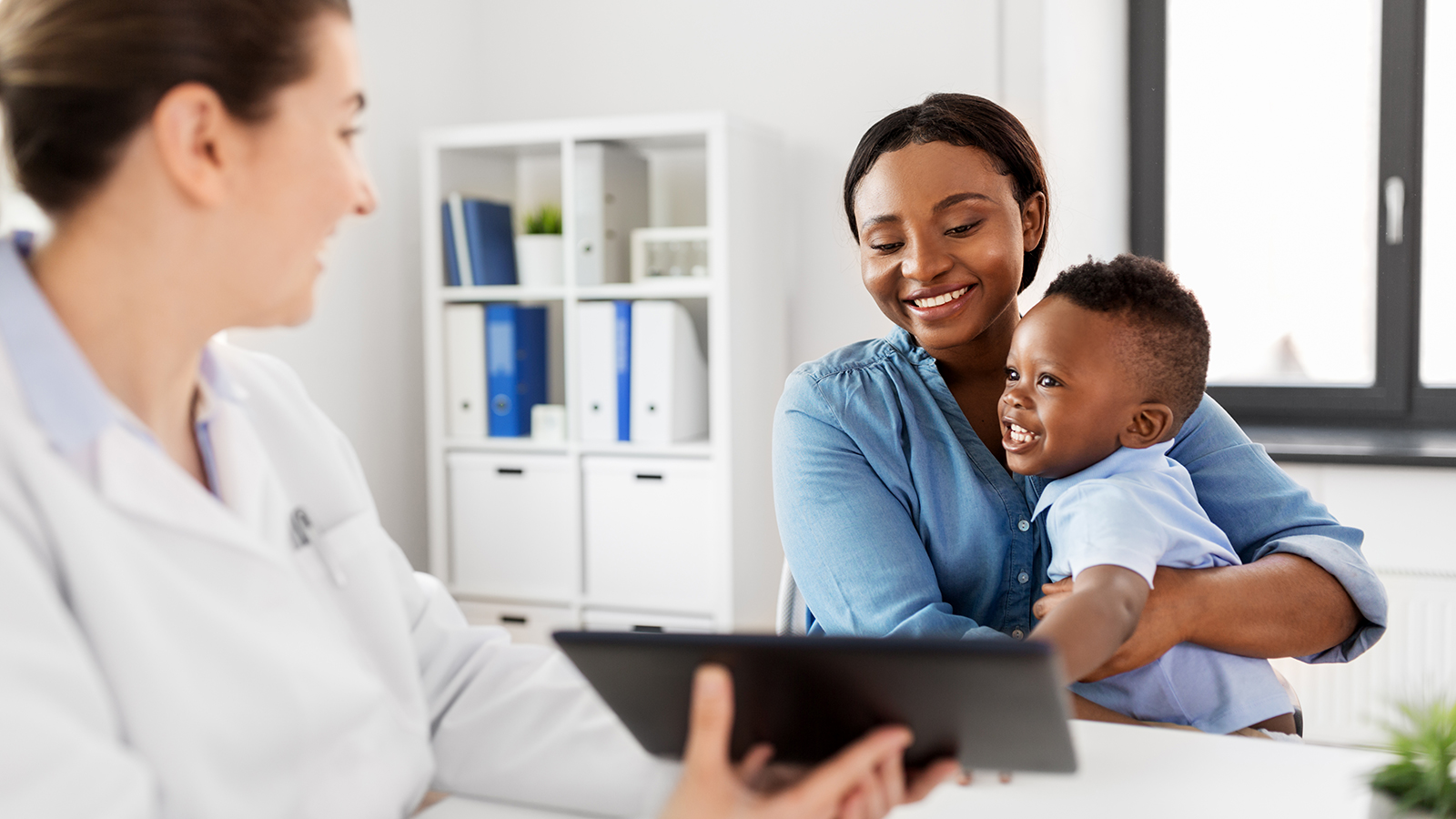 Woman and Child at Doctor Woman and Child Visiting Doctor