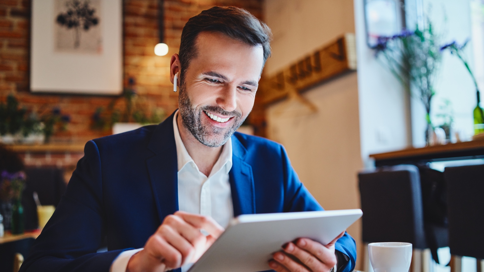 Securing Your Business business owner working on iPad