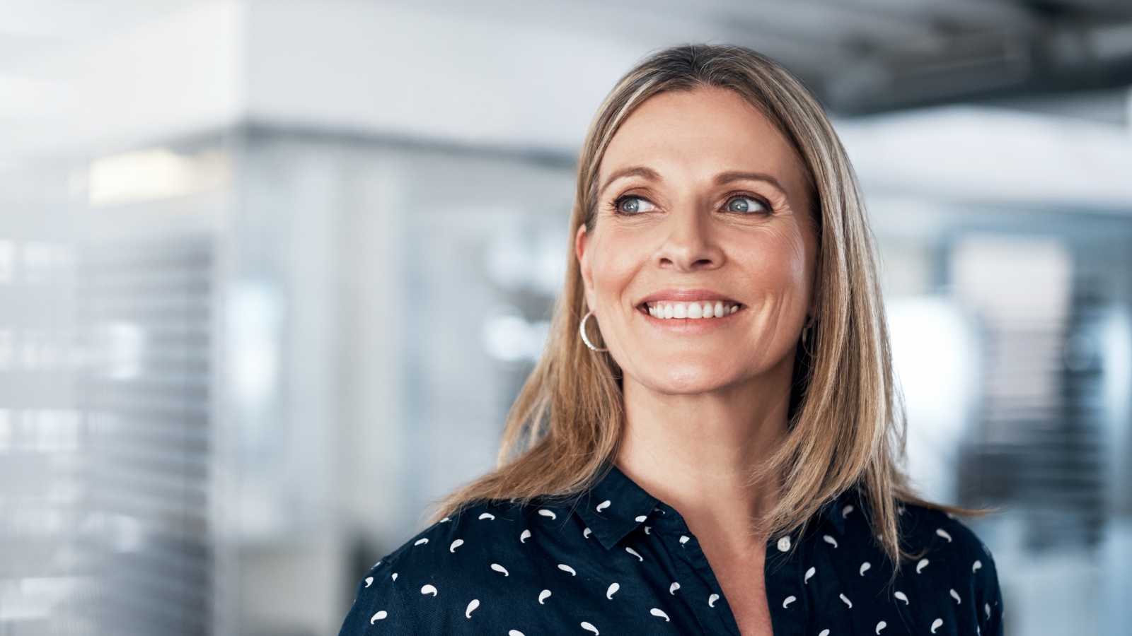 employee benefits open enrollment businesswoman smiling