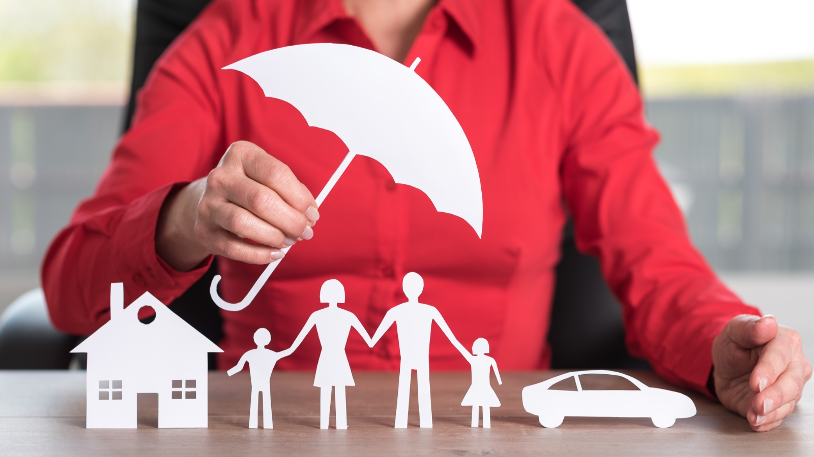 Umbrella Insurance umbrella covering a family, home, and vehicle
