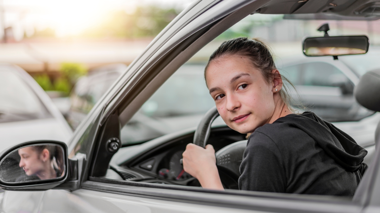 teen driver safety teenage girl driving a car